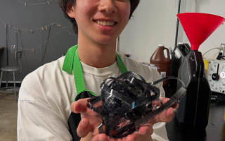 Media Arts student holding film
